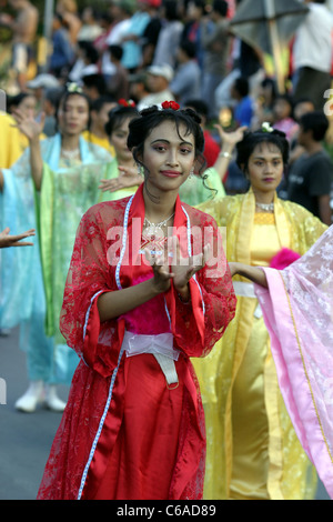 Members of Falun Gong (alternatively Falun Dafa) in procession of the Kuta Carnival. Stock Photo