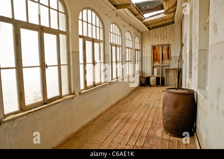 Old building in abandoned diamond mining town of Kolmanskop, Namibia Stock Photo