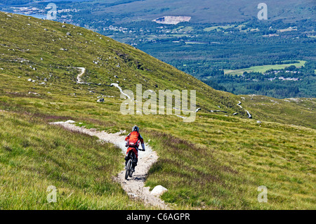 Biker on Off Beat Downhill track at Nevis Range on Aonach Mor mountain near Fort William Scotland Stock Photo