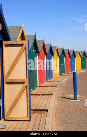 Colorful painted beach huts at Dawlish Warren Devon Stock Photo