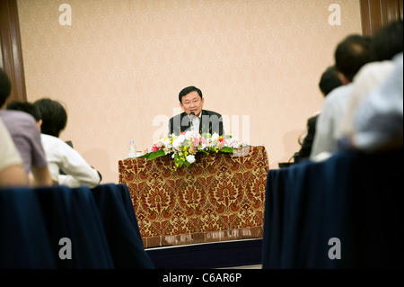Thaksin Shinawatra, former prime minister of Thailand, speaks during a group interview in Tokyo, Japan on 23 Aug. 2011. Stock Photo