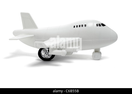 Plastic toy passenger jet plane on white background Stock Photo