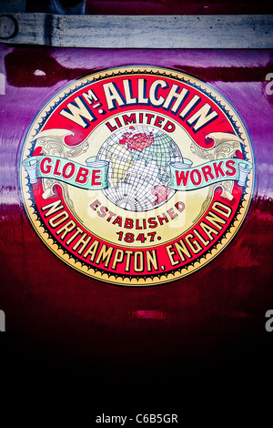 Badge on the side of the cylinder of a traction engine Stock Photo