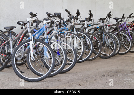 Cycles outside a sales & repair shop. Stock Photo