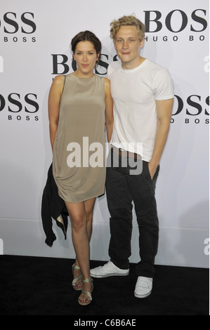 Ani Schromm and Matthias Schweighoefer arriving at the Boss Black fashion show during the Mercedes Benz Fashion Week Berlin Stock Photo