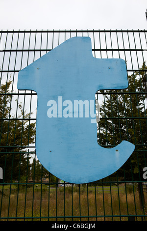 letter T sign on fence Stock Photo