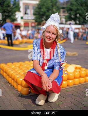 Young woman in traditional dress at Alkmaar Traditional Cheese Market, Alkmaar, Noord Holland, Kingdom of the Netherlands Stock Photo