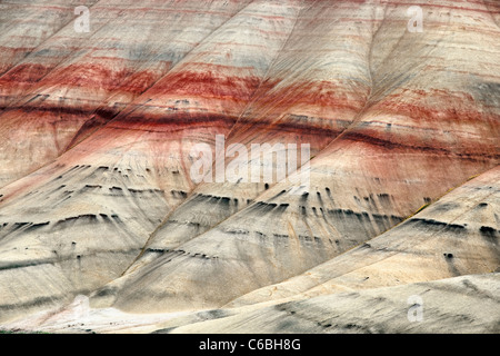 Bands of colorful ash deposits highlight Oregon’s Painted Hills Unit and the John Day Fossil Beds National Monument. Stock Photo