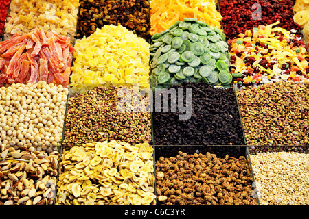 Market stall with various dried fruits and nuts Stock Photo