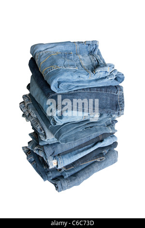 folded jeans in a pile on a white background Stock Photo
