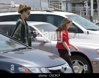 Actress Kate Beckinsale with her husband director Len Wiseman and her daughter Lily walking to their car after skating at an Stock Photo