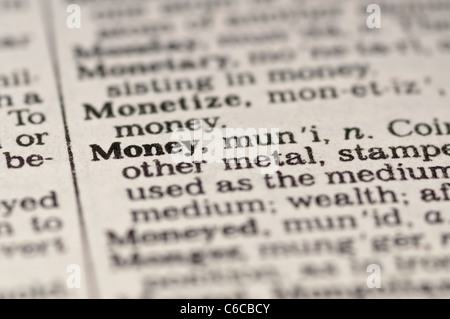 Extreme close up of the word MONEY found inside a dictionary Stock Photo