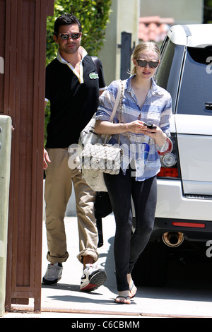 Amanda Seyfried and her boyfriend Dominic Cooper leaving a personal trainers house in West Hollywood. Los Angeles, California - Stock Photo