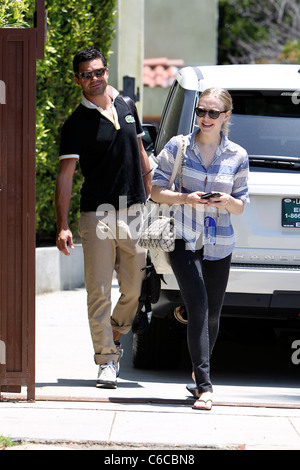 Amanda Seyfried and her boyfriend Dominic Cooper leaving a personal trainers house in West Hollywood. Los Angeles, California - Stock Photo