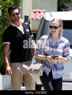 Amanda Seyfried and her boyfriend Dominic Cooper leaving a personal trainers house in West Hollywood. Los Angeles, California - Stock Photo