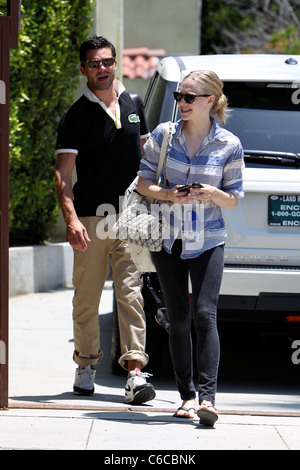 Amanda Seyfried and her boyfriend Dominic Cooper leaving a personal trainers house in West Hollywood. Los Angeles, California - Stock Photo