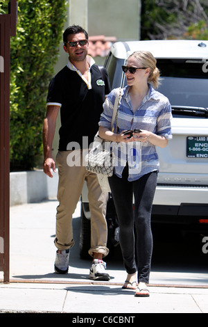 Amanda Seyfried and her boyfriend Dominic Cooper leaving a personal trainers house in West Hollywood. Los Angeles, California - Stock Photo