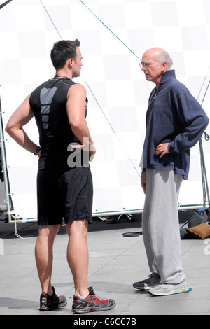 Cheyenne Jackson and Larry David filming a scene for HBO's 'Curb Your Enthusiasm' on location in Manhattan New York City, USA - Stock Photo