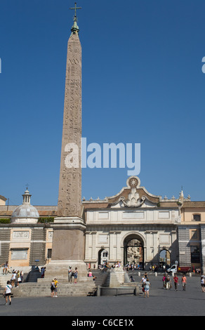 An Egyptian obelisk of Ramesses II from Heliopolis stands in the Piazza del Popolo, Rome, Italy. Stock Photo