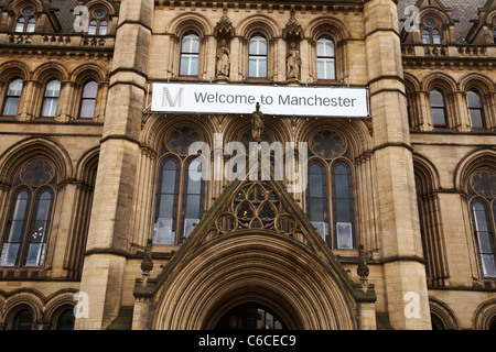 Welcome to Manchester banner on Town hall in Manchester UK Stock Photo