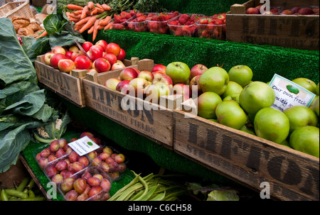 Fruit and vegetables on a fruit and vegetable market stall - landscape shot. Stock Photo