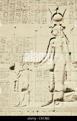 Relief carving of the famous Cleopatra VII and her son Caesarion at Dendara, Egypt Stock Photo