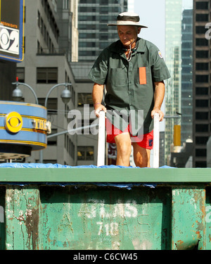 Bill Murray diving into a makeshift pool while filming a segment outside The Ed Sullivan Theater for the 'Late Show with David Stock Photo