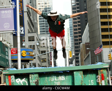 Bill Murray diving into a makeshift pool while filming a segment outside The Ed Sullivan Theater for the 'Late Show with David Stock Photo