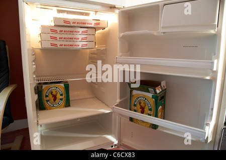 beer and pizza in a fridge winnipeg manitoba canada Stock Photo