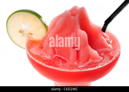 frozen strawberry margarita daiquiri with lime and black straw isolated on white background Stock Photo