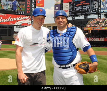 Prince Harry and Rod Barajas pose for photographs at the NY Mets