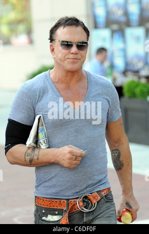 Mickey Rourke out shopping with girlfriend in the West Village. New York City, USA - 02.07.10 Ivan Nikolov Stock Photo