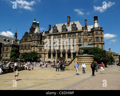 Sheffield Town Hall and Peace Gardens on a hot day crowded with people enjoying good weather  South Yorkshire Stock Photo
