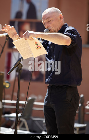 NOVELLO, ITALY - MAY 28: Writer Hanif Kureishi speaks at Collisioni 2011 on May 28, 2011 Novello, Italy. Stock Photo