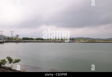 Lagoon held by barrage dam on river Rhone France south of Vallabregues north of Tarascon control flow and generate electricity Stock Photo