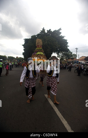 Mans with Gunungan from Jeruk Wudel Village Stock Photo