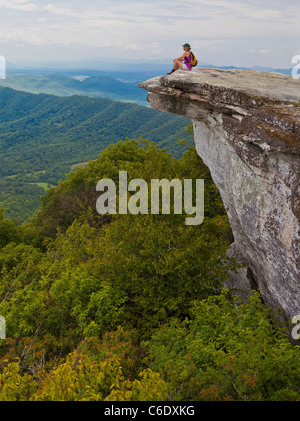 APPALACHIAN TRAIL, VIRGINIA, USA - Woman hiker at McAfee Knob on Catawba Mountain, near city of Roanoke. Stock Photo