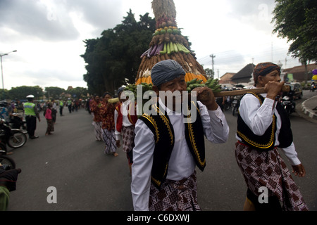 Mans with Gunungan from Jeruk Wudel Village Stock Photo