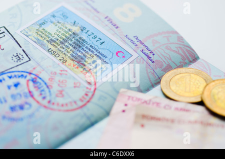 Passport with Turkish lira Stock Photo