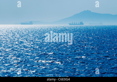 Greece, Oil tankers and cargo ships on Aegean Sea Stock Photo