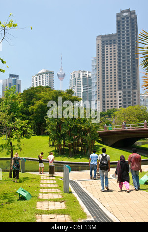 KLCC Park at the Petronas Twin Towers in front of the skyline with office buildings and hotels, Kuala Lumpur, Malaysia, Asia Stock Photo