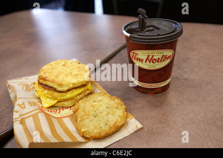 medium coffee and breakfast in tim hortons coffee shop canada Stock Photo