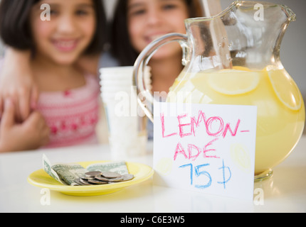 USA, New Jersey, Jersey City, Close up of two girl's selling lemonade Stock Photo