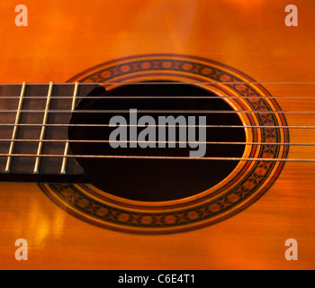 Close up of sound hole of acoustic guitar Stock Photo