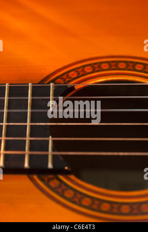 Close up of sound hole of acoustic guitar Stock Photo