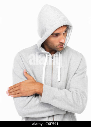 Young man in hoodie looking away Stock Photo