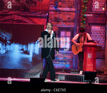 Ricardo Arjona performs live as part of a special Valentine's concert at the Jose Miguel Agrelot Coliseum Hato Rey, Puerto Rico Stock Photo