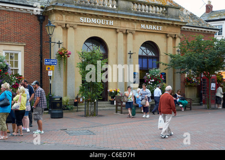 Market building and square in Sidmouth, Devon, England with shoppers and tourists. Stock Photo