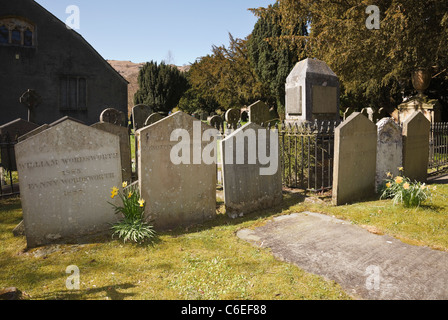 Grasmere, Cumbria, UK. William Wordsworth family graves in St Oswald's Parish Church graveyard in the village Stock Photo