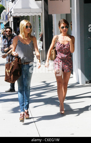 Stephanie Pratt and Audrina Patridge filming scenes for MTV's 'The Hills' on Robertson Boulevard while shopping at Anya Stock Photo